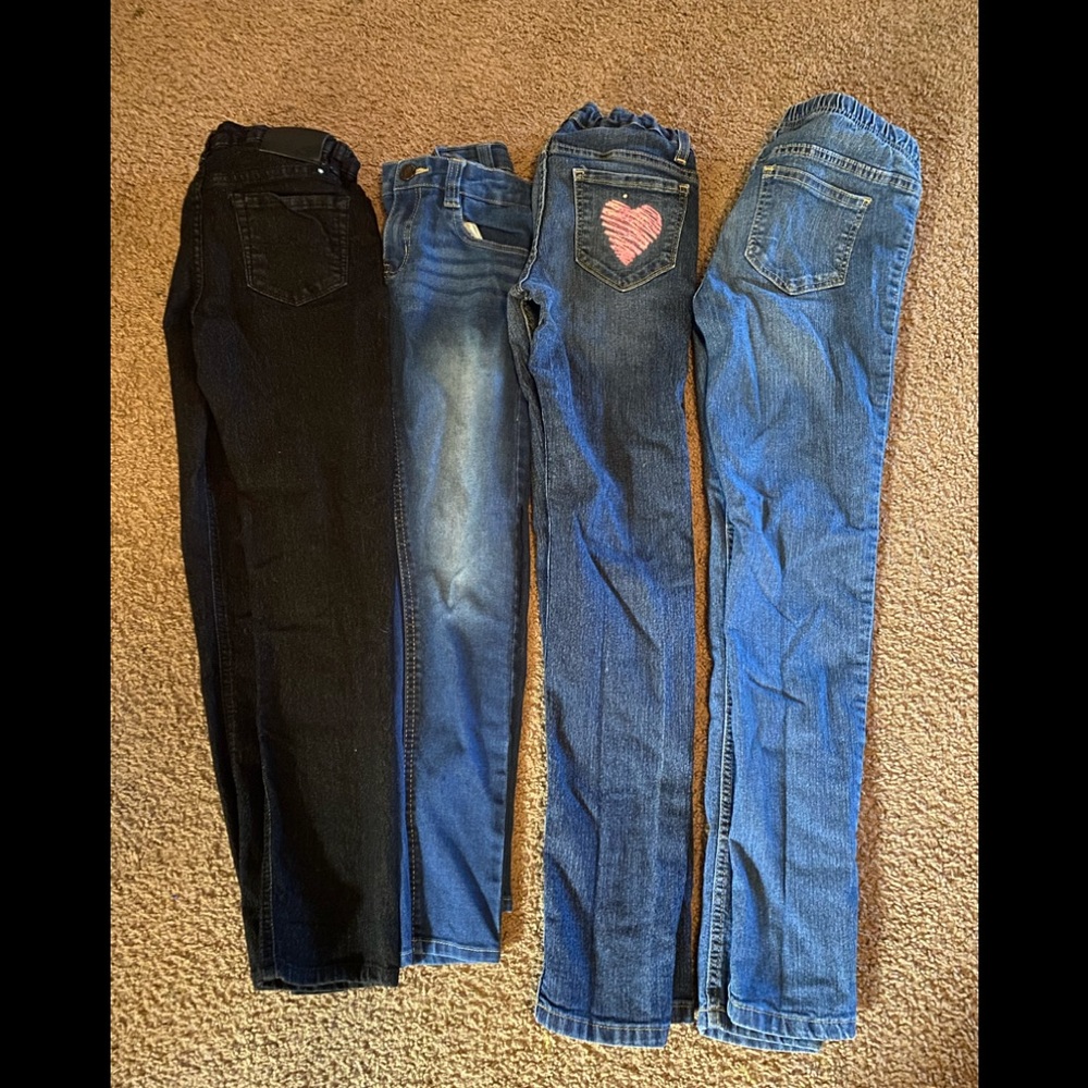 Four pairs of youth size 12 namebrand pants